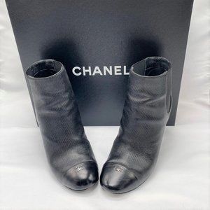 Chanel Black Leather Ankle Boots With Silver Interlocking CC Logo On Toe